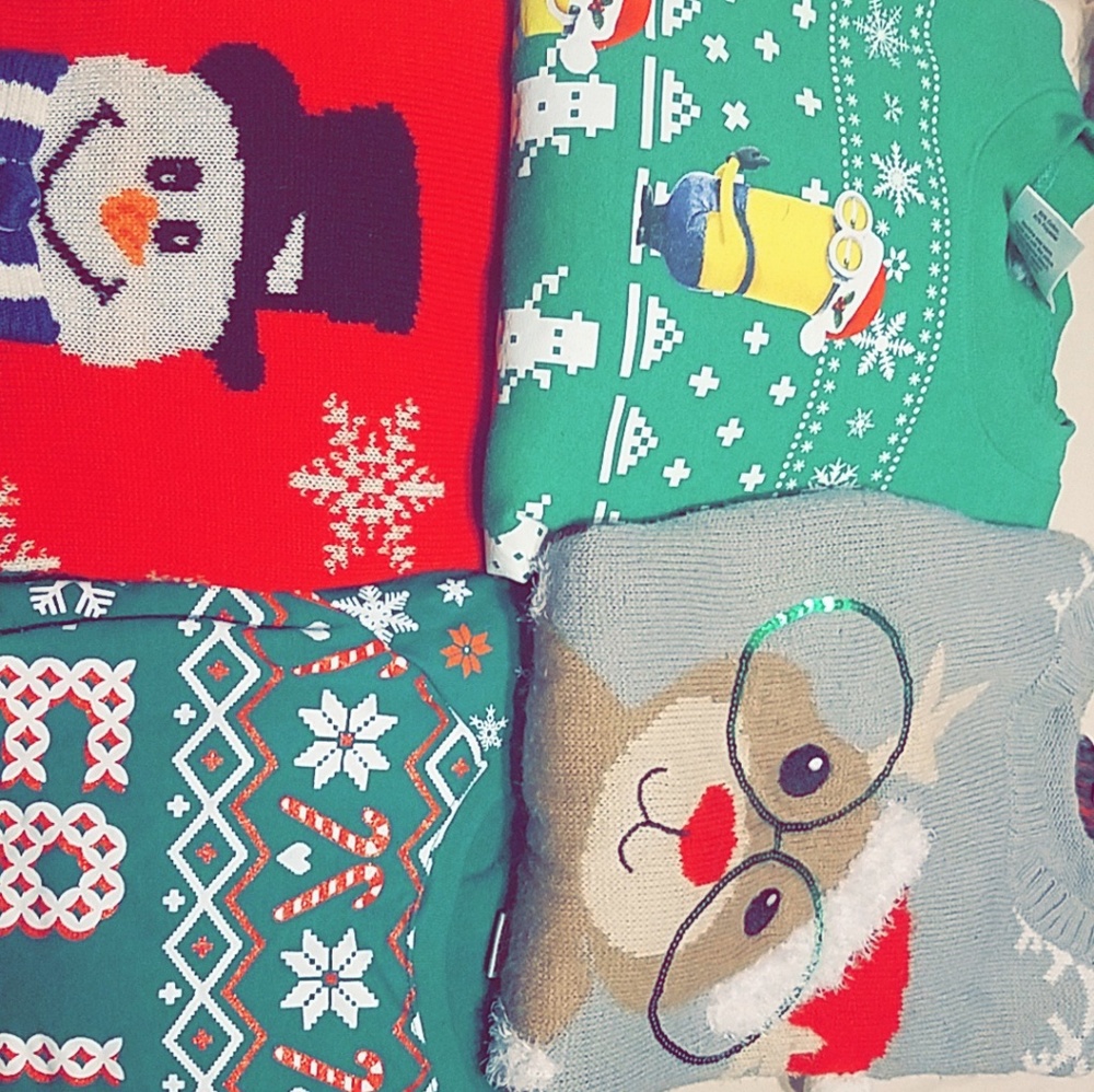 4 Christmas sweaters & 1 pair of candy cane socks
